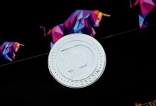 a close up of a coin on a black surface
