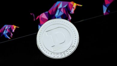 a close up of a coin on a black surface