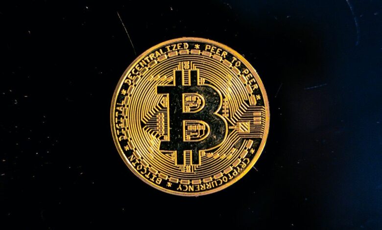 a bitcoin on a black background